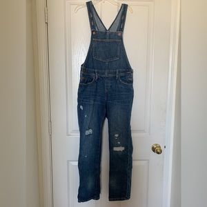 Old navy blue Jean overalls
